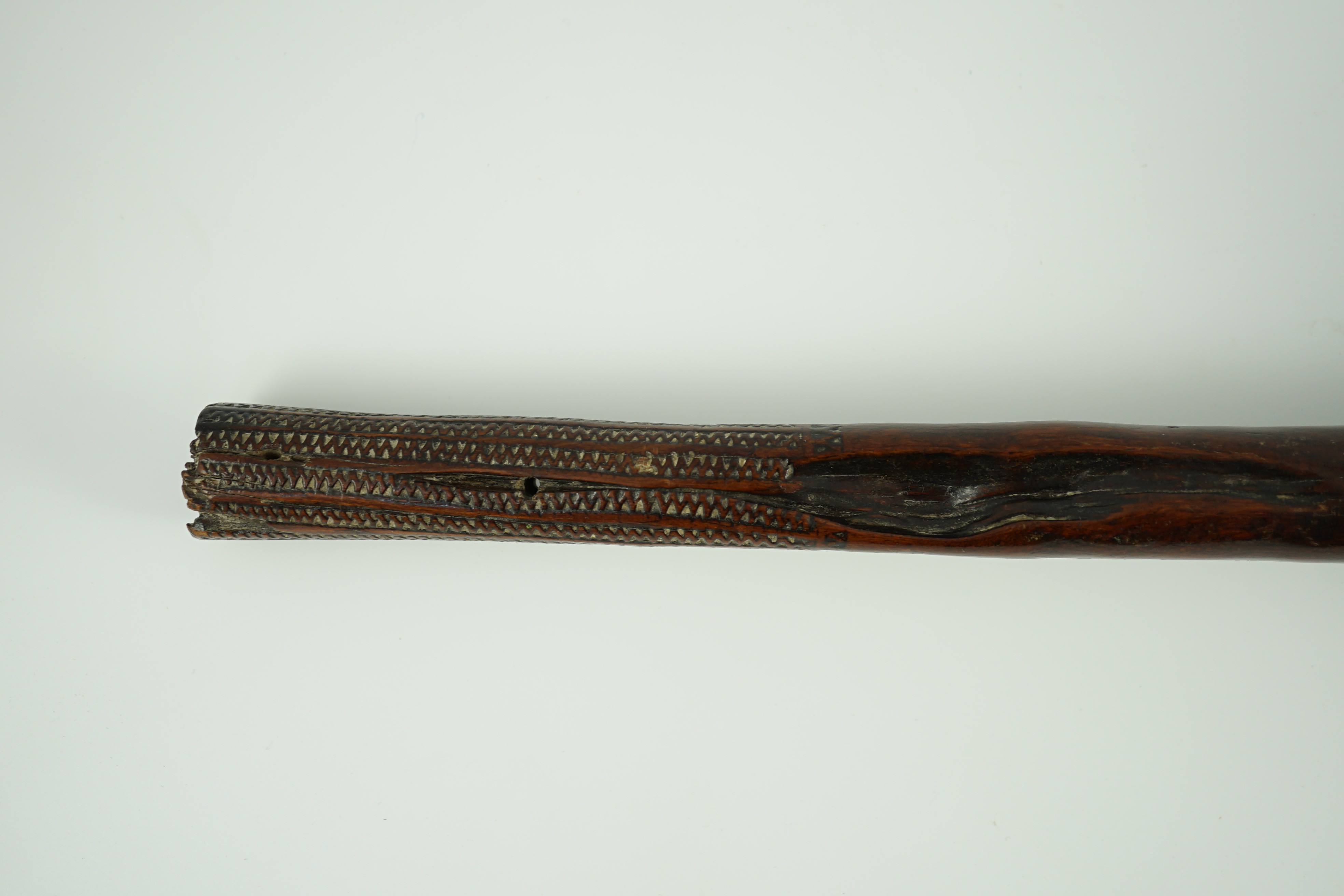 A Fijian hardwood throwing club, 40cm long